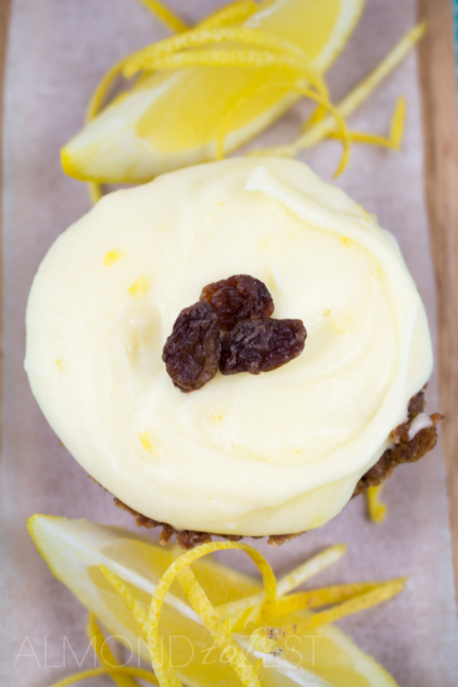 Tangy Lemon Slice - Thick soft fruity flavored base with a tangy lemon frosting! Easy to make with no mixer required!! Must.Make.Now. | almondtozest.com