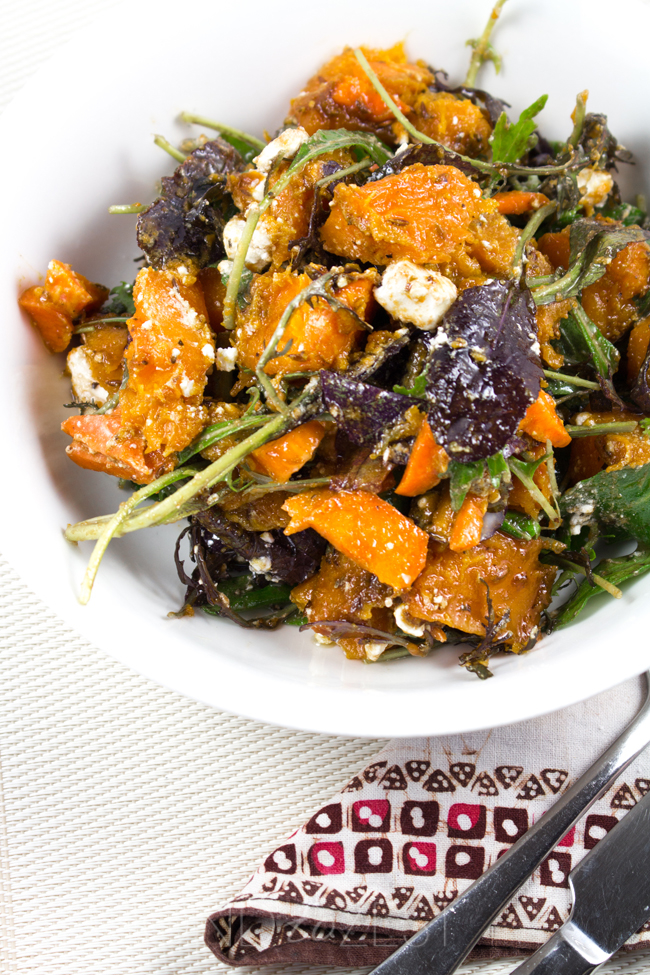 Crunchy Pumpkin Salad - Vibrant cumin roasted pumpkin chunks, crumbles of creamy feta, carrot, mixed lettuce leaves and a sweet balsamic dressing! Healthy and AMAZING