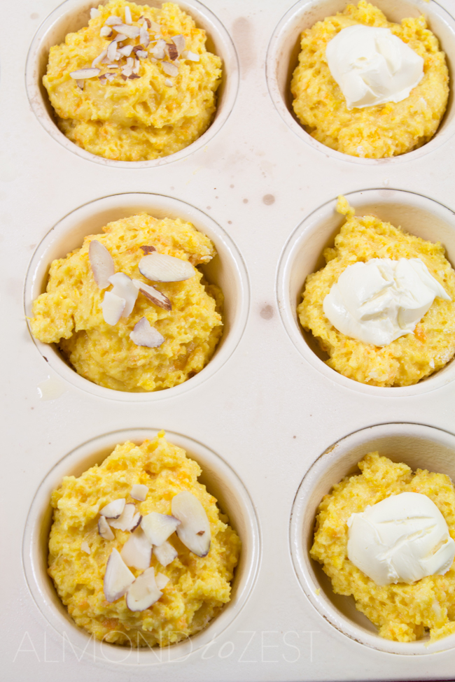 Orange and Cream Cheese Muffins - One of the BEST muffin recipes ever! Super soft, moist, zesty flavor with a glorious cream cheese center. Sooo YUM!!