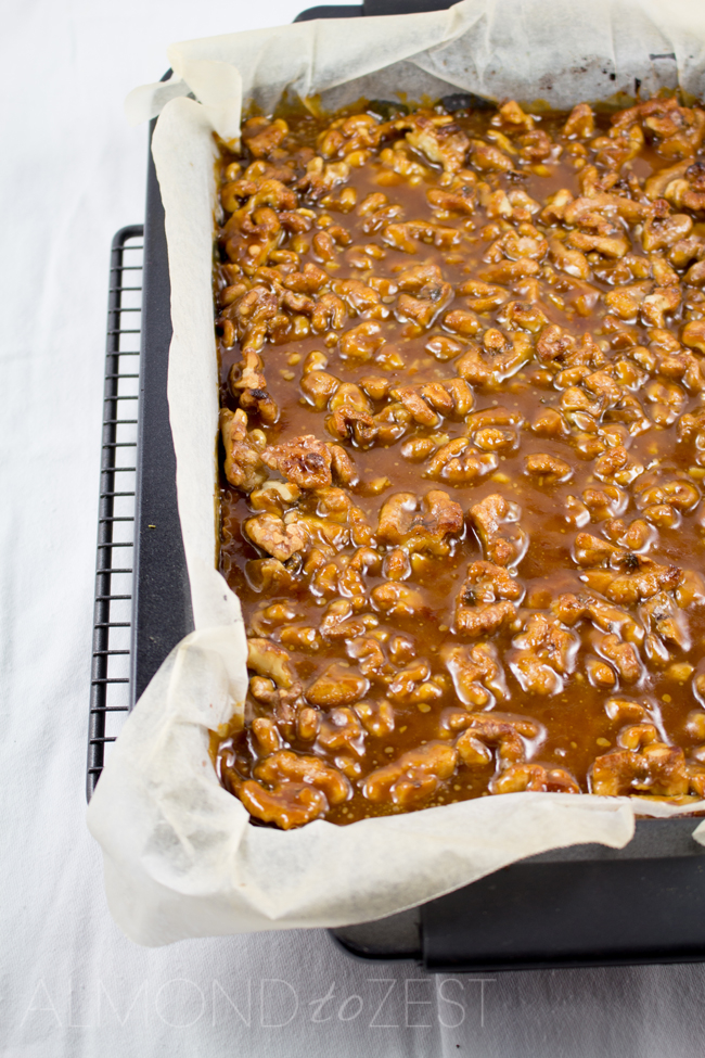Caramel and Walnut Slice - Super soft, crumbly slice topped with crunchy walnuts and chewy caramel! You HAVE to try this it's crazy good!!