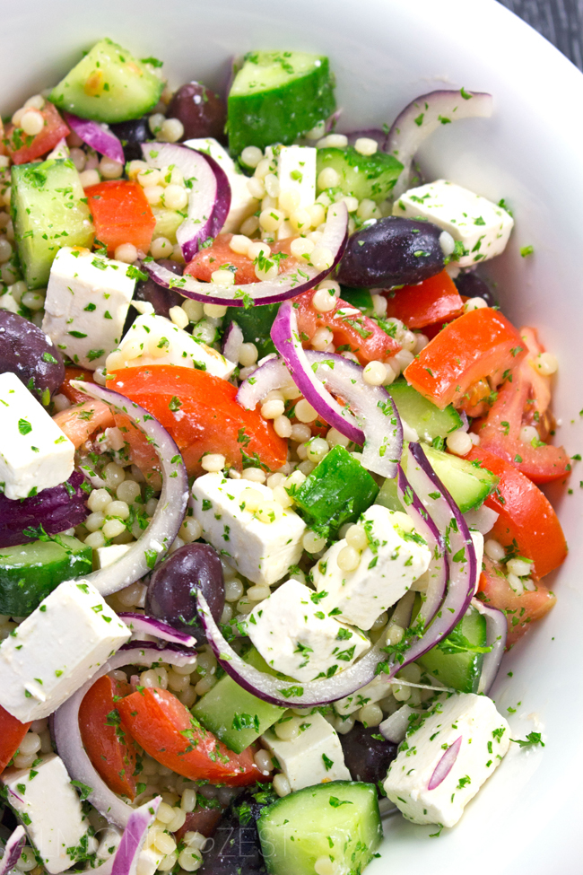 Israeli Couscous Greek Salad Recipe - Light & refreshing salad packed full of fresh produce perfect for getting healthy this summer!! Vegetarian / Gluten-free